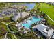 Gorgeous aerial view of a community pool, landscaping, and luxurious outdoor amenities at 16126 San Donato Pl, Bradenton, FL 34211