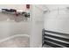 Functional walk-in closet with ample storage, wire shelving, and racks for organized clothing and accessories at 16126 San Donato Pl, Bradenton, FL 34211