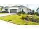 Beautiful single-Gathering home with an attached garage and well-manicured lawn at 16126 San Donato Pl, Bradenton, FL 34211
