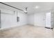 Spacious two car garage with white-painted block walls and concrete floor at 16126 San Donato Pl, Bradenton, FL 34211