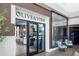 Charming Olive & Vine restaurant entrance with a modern interior and glass display at 16126 San Donato Pl, Bradenton, FL 34211