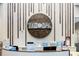 Upscale spa reception area with modern design, wood accents, and retail display at 16126 San Donato Pl, Bradenton, FL 34211