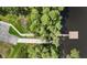 Aerial community shot with docks and waterside walking path for outdoor recreation at 1827 Hammocks Ave # 1303, Lutz, FL 33549