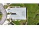 Aerial shot of townhome complex with well-maintained roofs, landscaping, and ample parking at 1827 Hammocks Ave # 1303, Lutz, FL 33549