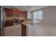 Kitchen featuring stainless steel appliances, granite countertops, breakfast bar, and ample cabinet space at 20109 Bay Cedar Ave, Tampa, FL 33647