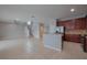 Bright, open concept layout connecting the kitchen to the living space at 20109 Bay Cedar Ave, Tampa, FL 33647