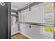 Walk-in closet featuring custom shelving and window views at 204 W Calhoun St, Plant City, FL 33563