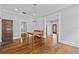 Cozy living room featuring hardwood floors, neutral paint, and an open layout at 204 W Calhoun St, Plant City, FL 33563