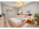 Bright bedroom with neutral walls and minimalist décor, creating a peaceful retreat at 2526 W Jean St, Tampa, FL 33614
