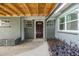 Charming front porch with brick accents and well-maintained landscaping at 2526 W Jean St, Tampa, FL 33614