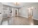 Open living space with tile flooring and views leading into hallway and other rooms at 2526 W Jean St, Tampa, FL 33614