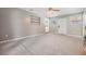 Living room with carpet and lots of light, showcasing a cozy and inviting atmosphere at 2526 W Jean St, Tampa, FL 33614