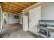 Covered outdoor space including an outdoor sink and counter at 2526 W Jean St, Tampa, FL 33614