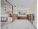 The living room with a large window and natural light at 260 42Nd Ave, St Pete Beach, FL 33706