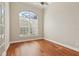 Hardwood floors highlight this office space with a fan and bright natural light at 2708 Coastal Range Way, Lutz, FL 33559