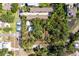Aerial view of property outlined in red shows the generous lot size and location at 272 Orange St, Palm Harbor, FL 34683