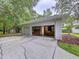 Attached two-car garage with interior access, perfect for parking, storage, or workshop at 27511 Hialeah Way, Wesley Chapel, FL 33544