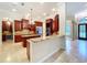 Gourmet kitchen featuring custom wood cabinetry and granite countertops at 27511 Hialeah Way, Wesley Chapel, FL 33544