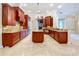 Elegant kitchen with granite countertops, custom cabinets, and modern appliances at 27511 Hialeah Way, Wesley Chapel, FL 33544
