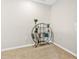 Versatile flex room with neutral carpet, stylish bookshelf, and ample natural light at 2771 Suncoast Blend Dr, Odessa, FL 33556