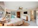 Beautiful bedroom featuring a door to the pool area, ceiling fan, and contemporary decor at 2990 Longbrooke Way, Clearwater, FL 33760