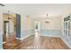 Light-filled dining room with wood floors and classic decor at 2990 Longbrooke Way, Clearwater, FL 33760
