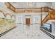 Spacious foyer with a grand staircase, high ceilings, marble floors, and a decorative mural at 3062 Sutton Woods Dr, Plant City, FL 33566