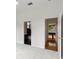 Bright hallway with hardwood floors at 3062 Sutton Woods Dr, Plant City, FL 33566