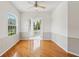 Bright room with hardwood floors and balcony access at 3062 Sutton Woods Dr, Plant City, FL 33566