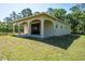 Exterior view of an open-air barn with a concrete foundation and an arched portico at 3452 Forelock Rd, Tarpon Springs, FL 34688