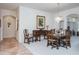 Elegant dining room featuring classic decor, chandelier lighting, and plenty of space at 3452 Forelock Rd, Tarpon Springs, FL 34688