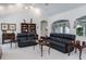 Inviting living room with comfortable seating, neutral tones, and a bright, open layout at 3452 Forelock Rd, Tarpon Springs, FL 34688