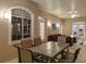 Inviting outdoor patio with comfortable seating and serene lighting, perfect for entertaining or relaxation at 3452 Forelock Rd, Tarpon Springs, FL 34688
