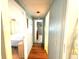 The hallway flows to bedrooms and living spaces at 3910 Sarah Dr, Wesley Chapel, FL 33543