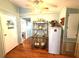 The kitchen area flows seamlessly with a decorative shelving unit at 3910 Sarah Dr, Wesley Chapel, FL 33543