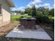 Backyard BBQ with concrete base, perfect for outdoor entertainment at 503 Sunset Rd, Plant City, FL 33563