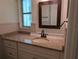 Bathroom featuring vanity with granite counters, perfect for a modern home at 503 Sunset Rd, Plant City, FL 33563