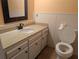 Bathroom with a granite countertop vanity, a modern faucet, and a toilet at 503 Sunset Rd, Plant City, FL 33563