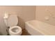 Bright bathroom with a toilet and bathtub perfect for relaxation at 503 Sunset Rd, Plant City, FL 33563