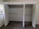 Spacious walk-in closet with bi-fold doors and shelving for optimal storage at 503 Sunset Rd, Plant City, FL 33563