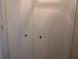 Hall closet with bi-fold doors for storing household items and personal belongings at 503 Sunset Rd, Plant City, FL 33563