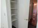 Hall closet with ample open shelving for convenient storage solutions at 503 Sunset Rd, Plant City, FL 33563