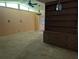 Open living space with a vintage ceiling fan and a built-in bookshelf at 503 Sunset Rd, Plant City, FL 33563