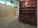 Open living space with a vintage ceiling fan and a built-in bookshelf at 503 Sunset Rd, Plant City, FL 33563