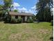 Charming outbuilding provides flexible space for a studio, office, or guest accommodations at 503 Sunset Rd, Plant City, FL 33563