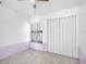 Bedroom with tiled flooring, closet, and natural light at 5122 Puritan Cir # 5122, Tampa, FL 33617