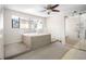 Unique bedroom with built-in platform bed, carpeted floors, and natural light from the window at 5122 Puritan Cir # 5122, Tampa, FL 33617