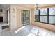 Sun-filled dining room with sliding glass doors and beautiful views at 5122 Puritan Cir # 5122, Tampa, FL 33617
