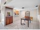 Bright dining room with tile flooring, wet bar, and a pass through to the kitchen at 5122 Puritan Cir # 5122, Tampa, FL 33617