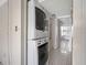 Efficient laundry area with stacked washer and dryer at 5122 Puritan Cir # 5122, Tampa, FL 33617